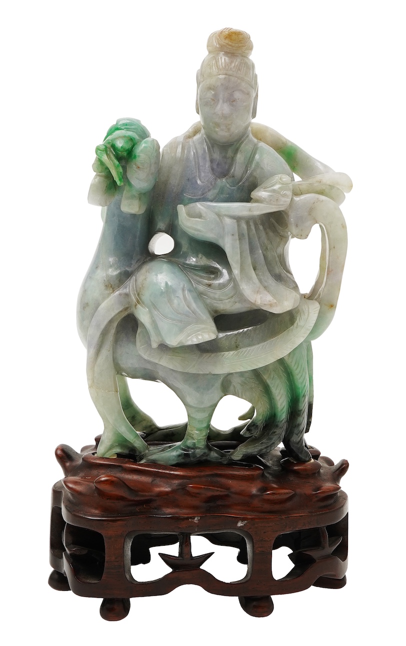 A Chinese jadeite figure of Xi Wangmu riding on a phoenix, late 19th/early 20th century